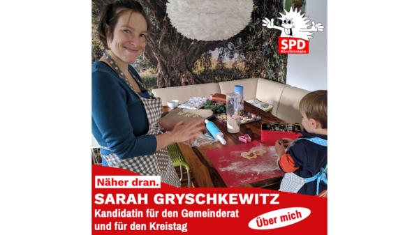Sarah Gryschkewitz mit einem Kind beim Kekse backen